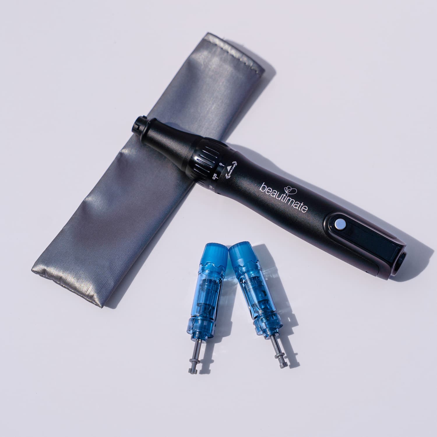 microneedling pen with cartridges and a protective pouch