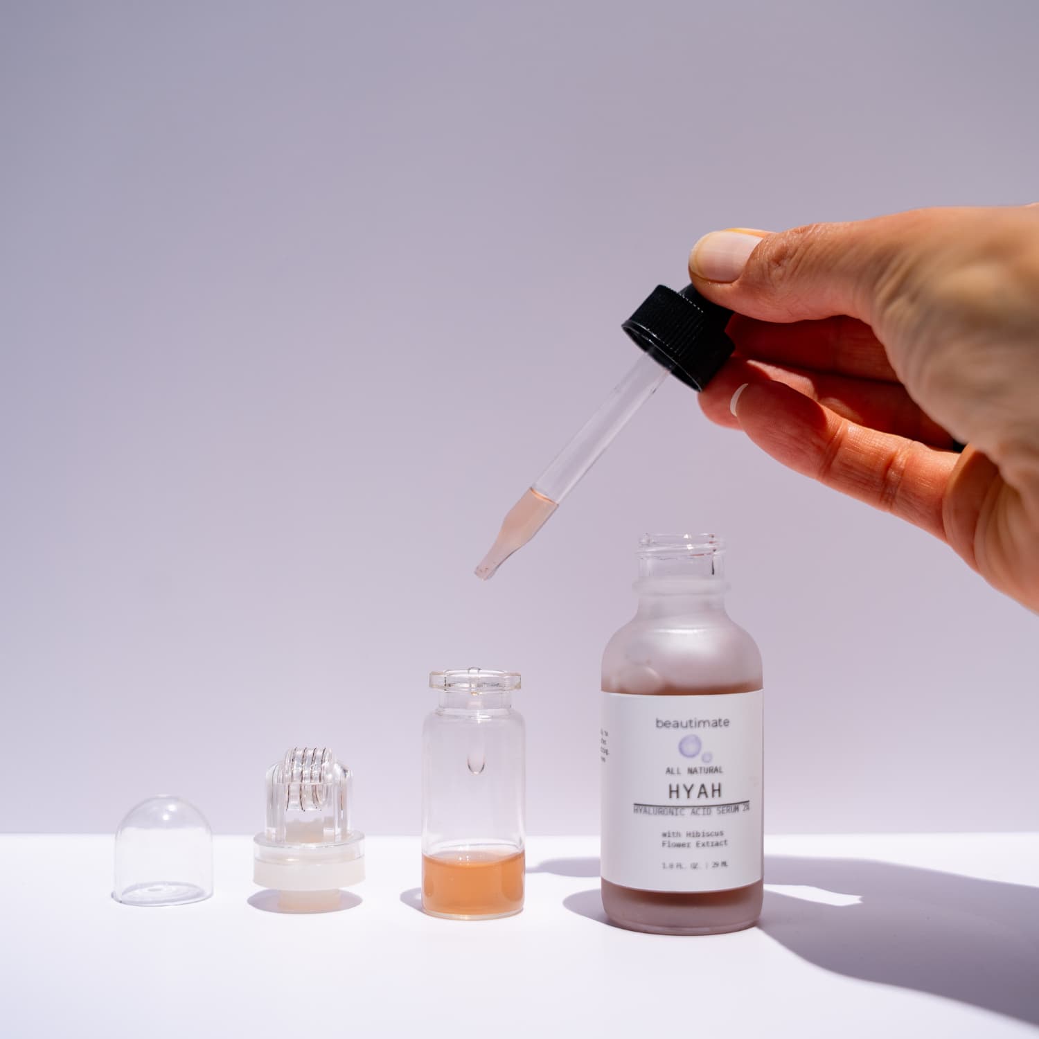 How to fill Beautimate Hydra Roller with hyaluronic acid serum through the top-opening reservoir