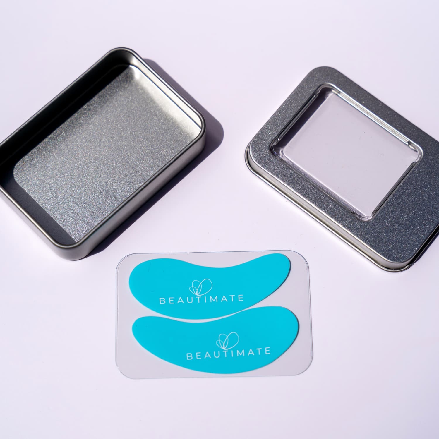 Multi-use silicone eye patches placed on forehead and smile lines for targeted hydration