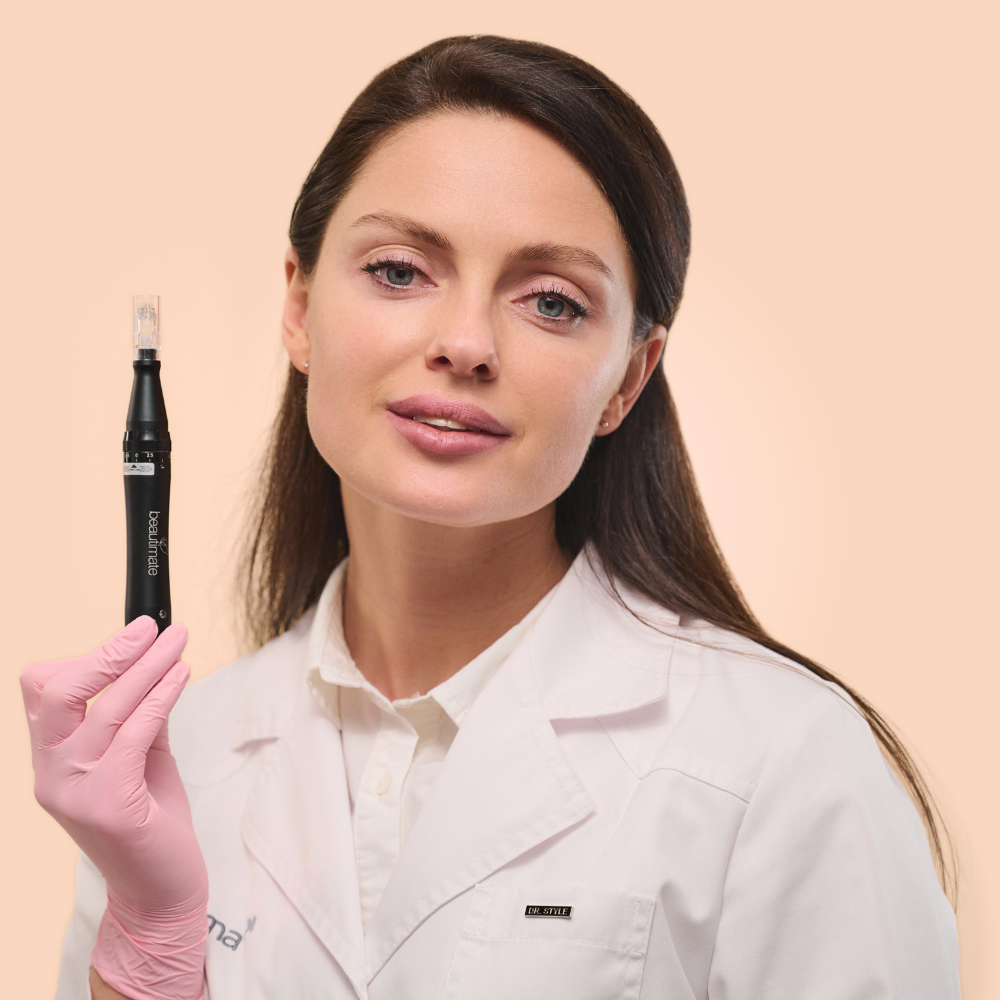 cosmetologist holding our derma pen