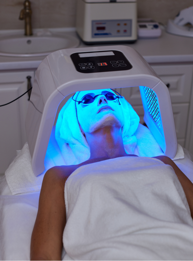 woman using led device blue light