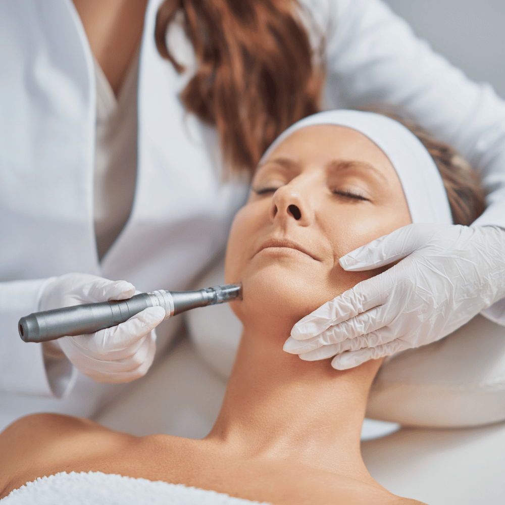 woman getting microneedling done using dr pen m8