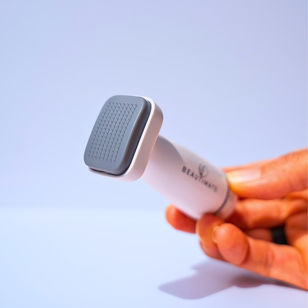 Using adjustable derma stamp on facial skincare routine