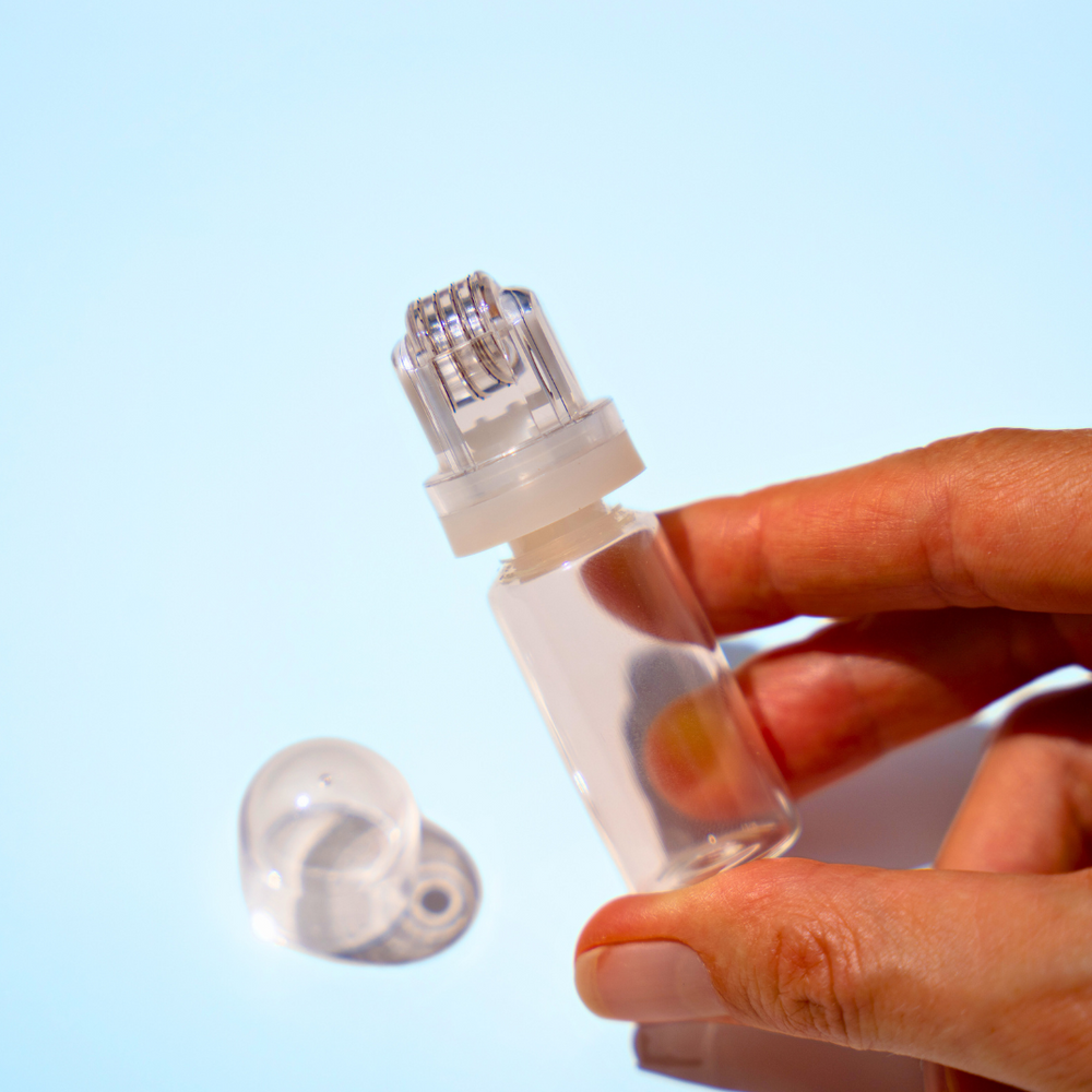 woman holding beautimate hydra roller 