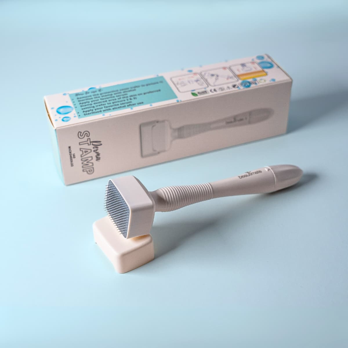 Beautimate Derma Stamp with the packaging 