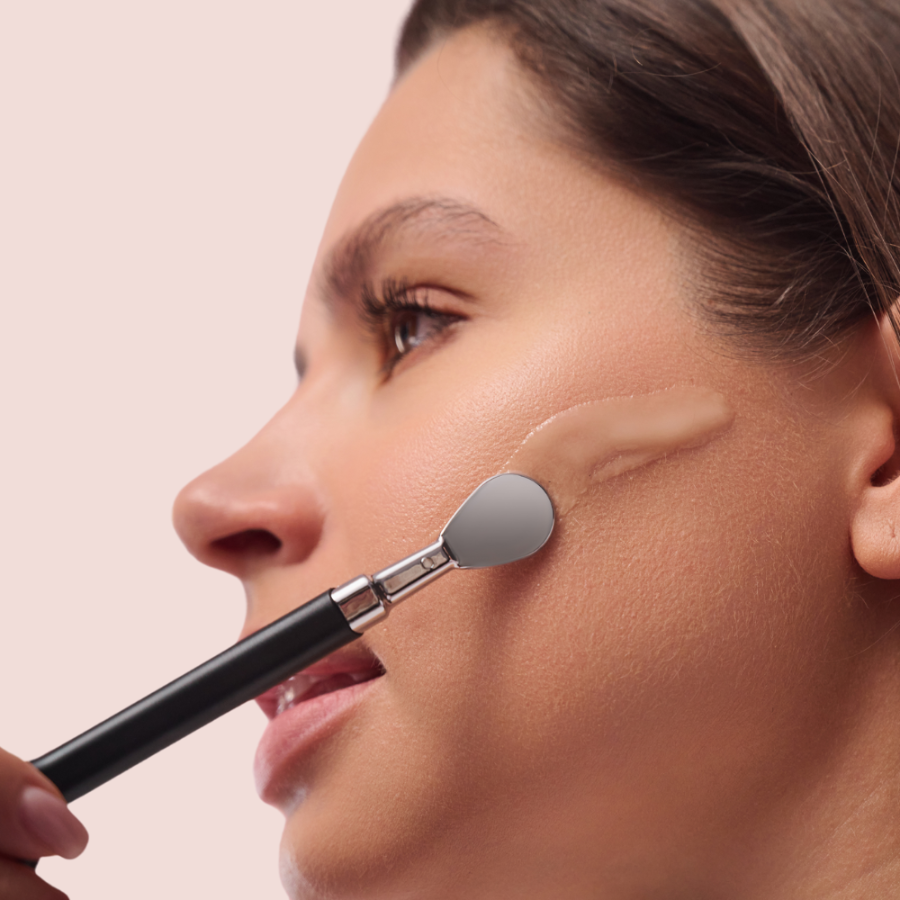 woman using serum scooper