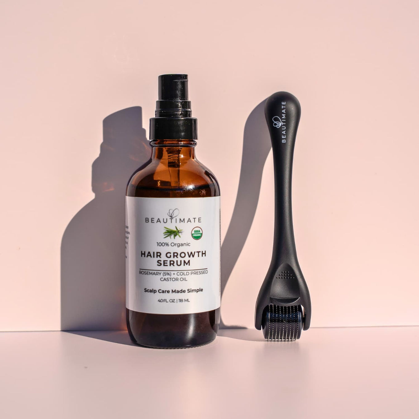 Close-up of Beautimate derma roller with USDA Organic rosemary oil for consistent scalp and hair care.