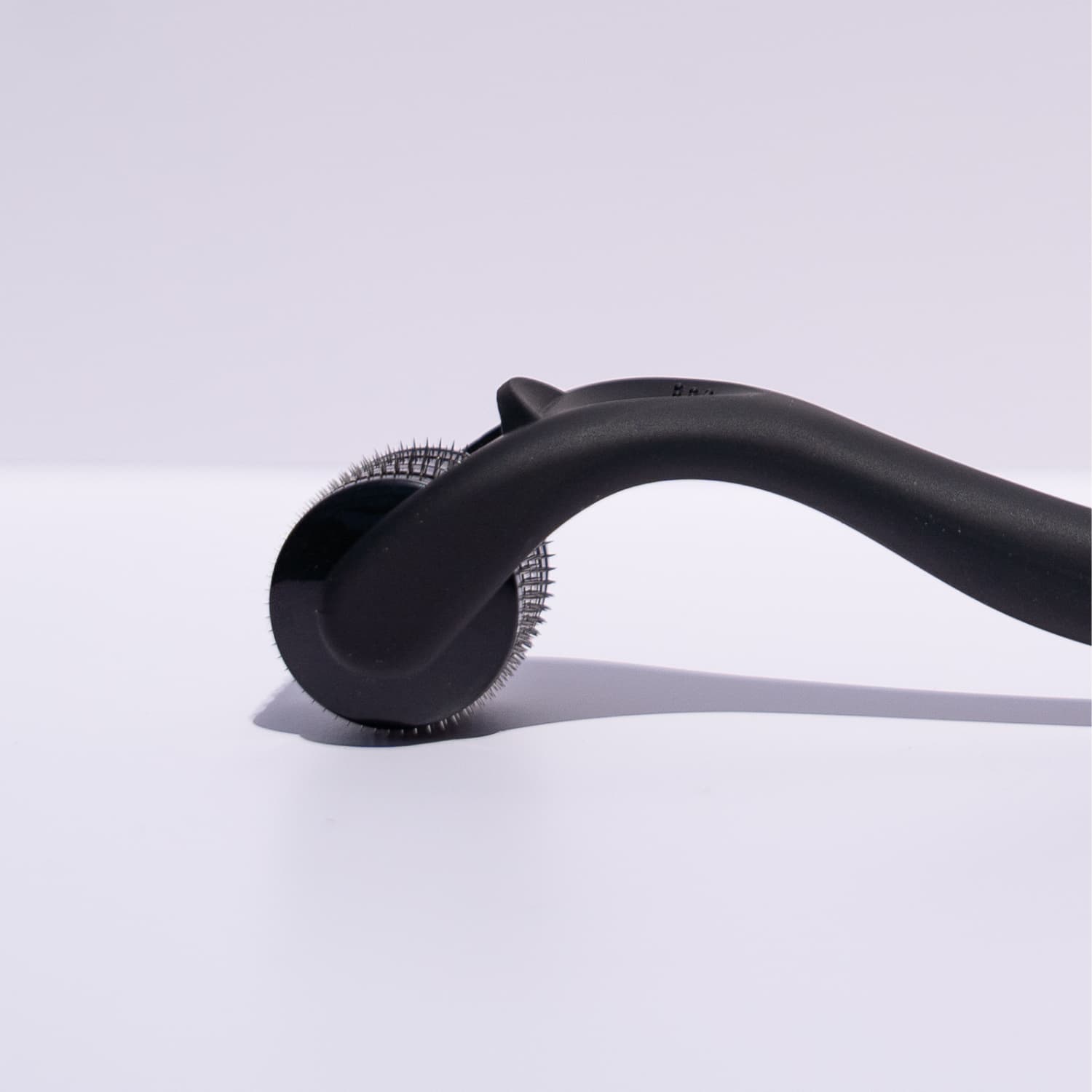 microneedle roller  for the face beard hair scalp -close up of the head 
