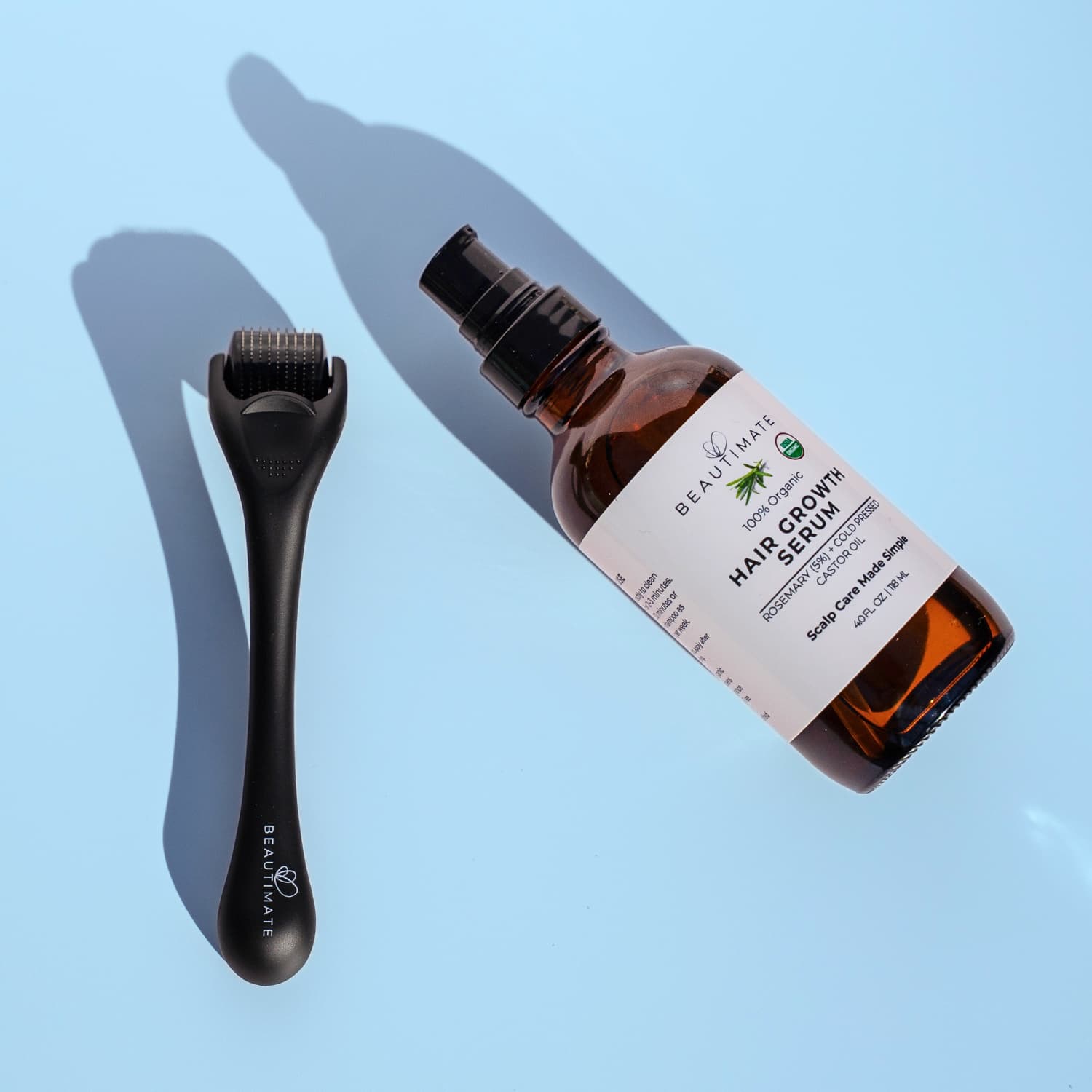 Derma roller paired with Beautimate rosemary oil serum for even scalp application and improved absorption.