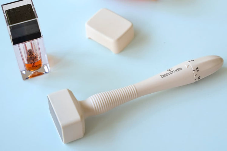 adjustable derma stamp from beautimate with serum in a hydra stamp microneedling tools