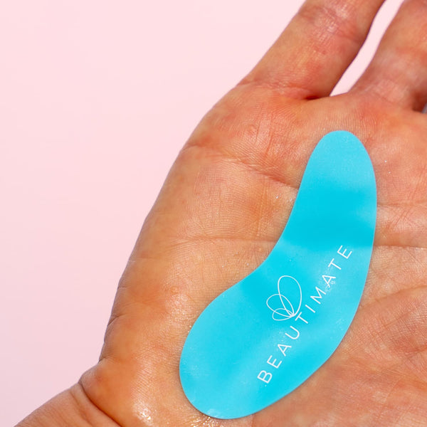 Reusable silicone eye patches used as part of a relaxing skincare routine.