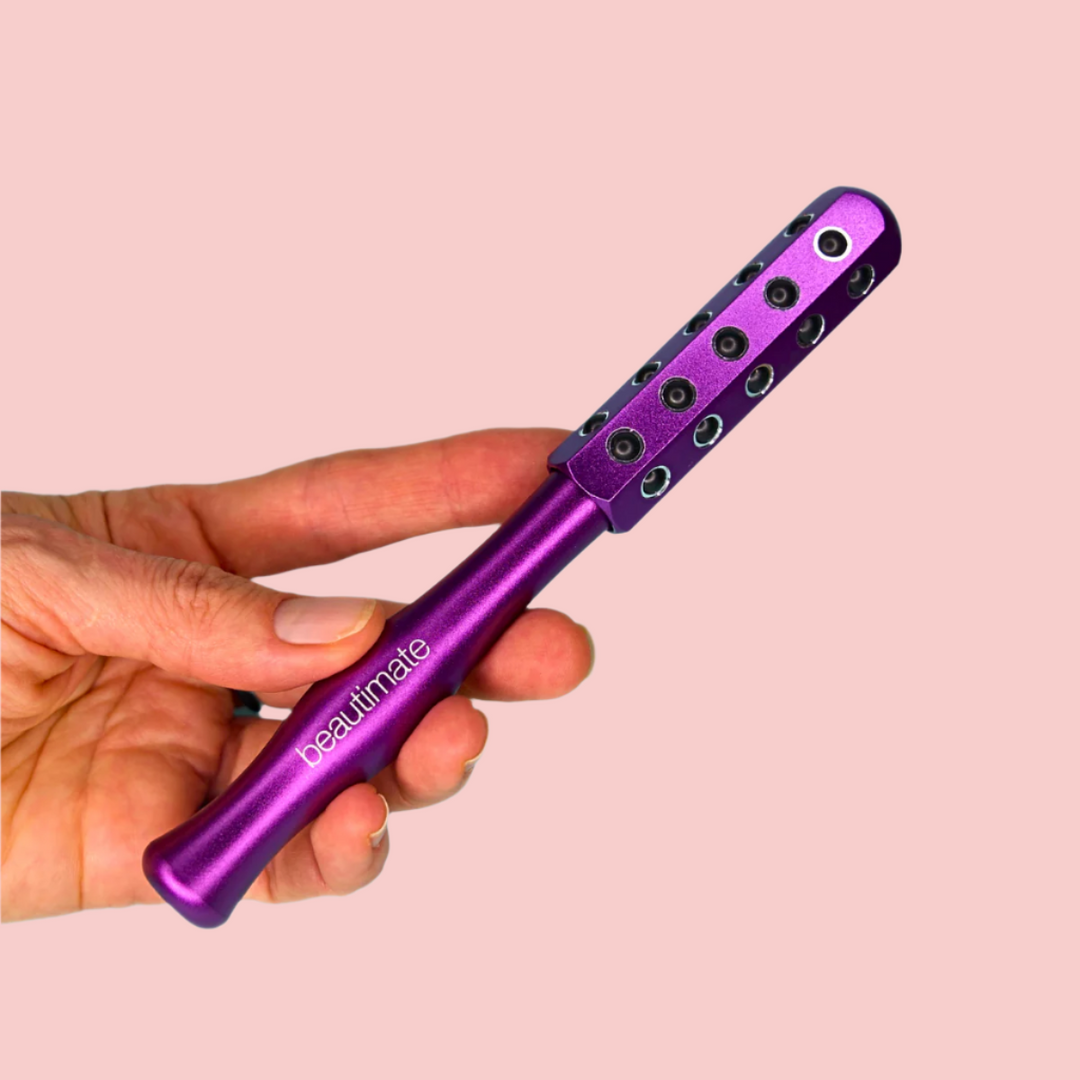 woman holding beautimate germanium roller in her hand