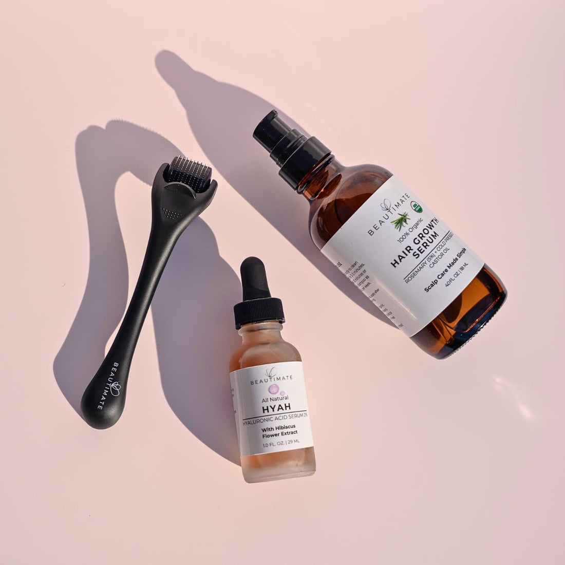 Derma roller hyah serum and rosemary oil scalp and skin care routine by Beautimate for maintenance and nourishment.