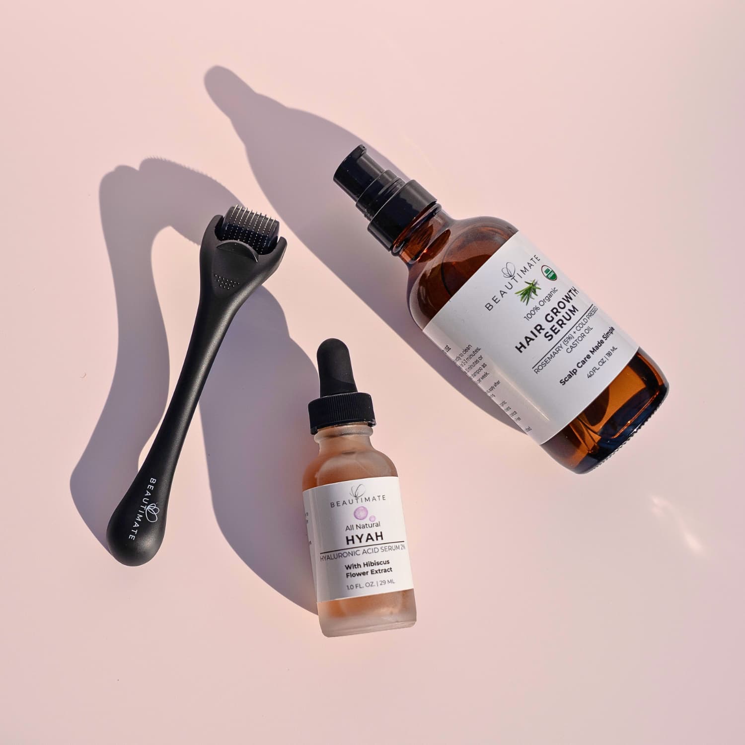 Derma roller hyah serum and rosemary oil scalp and skin care routine by Beautimate for maintenance and nourishment.