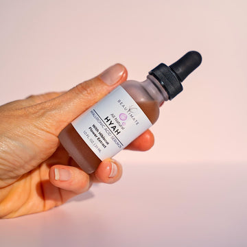 Close-up of Beautimate Hyah Serum bottle showing clear, lightweight hyaluronic acid formula.