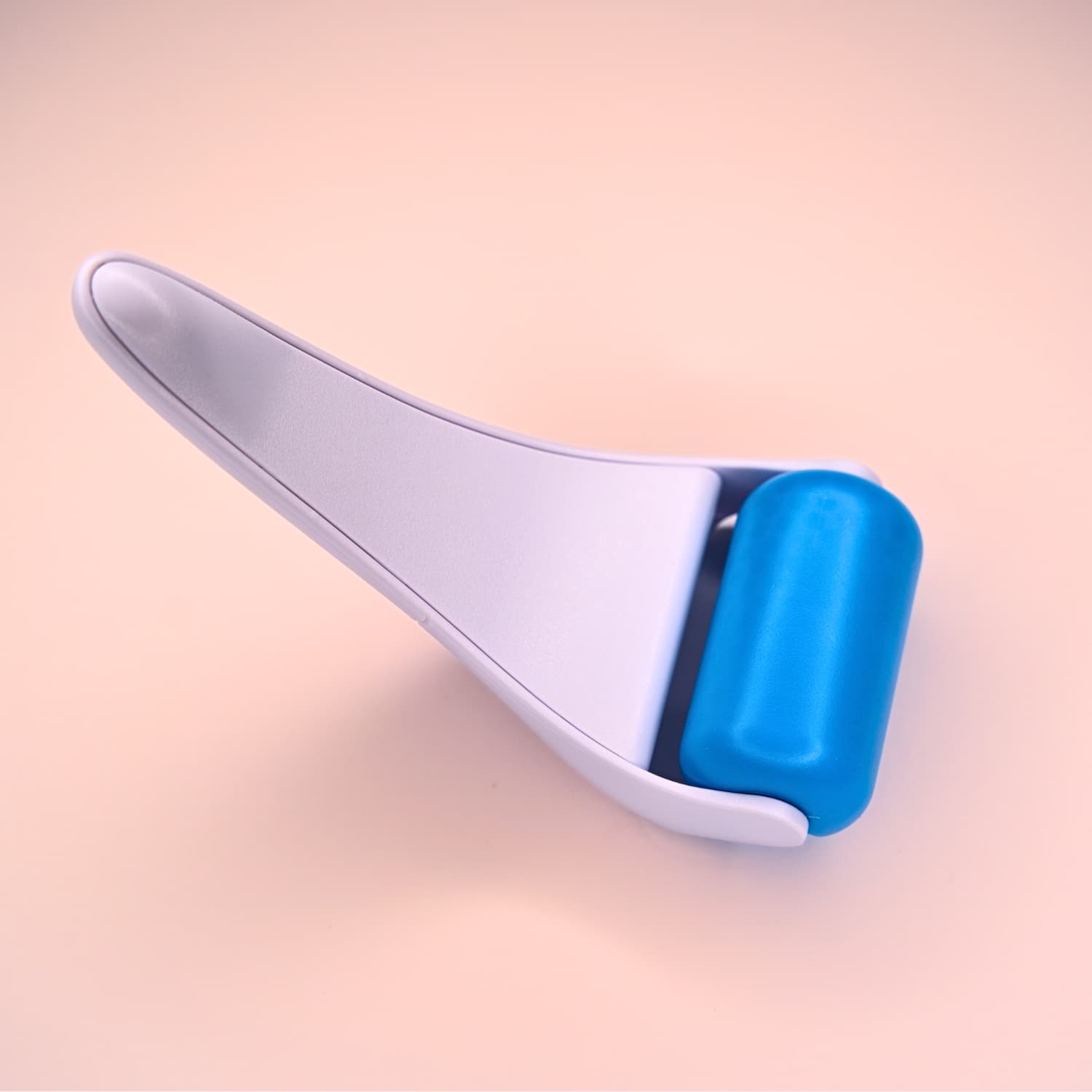 Beautimate Ice Roller held in hand to show ergonomic design and lightweight feel
