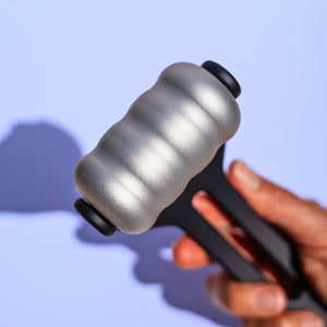 Close-up of the solid aluminum roller head on the Beautimate Metal Ice Roller.