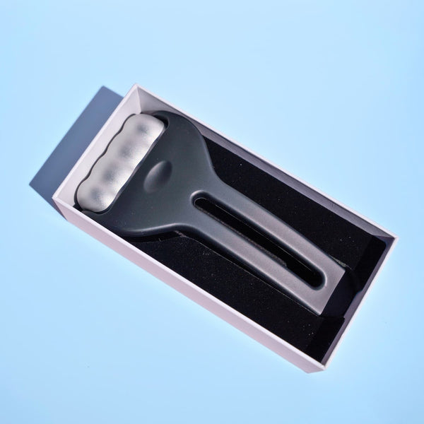 Beautimate Ice Roller with branded packaging shown in flat lay