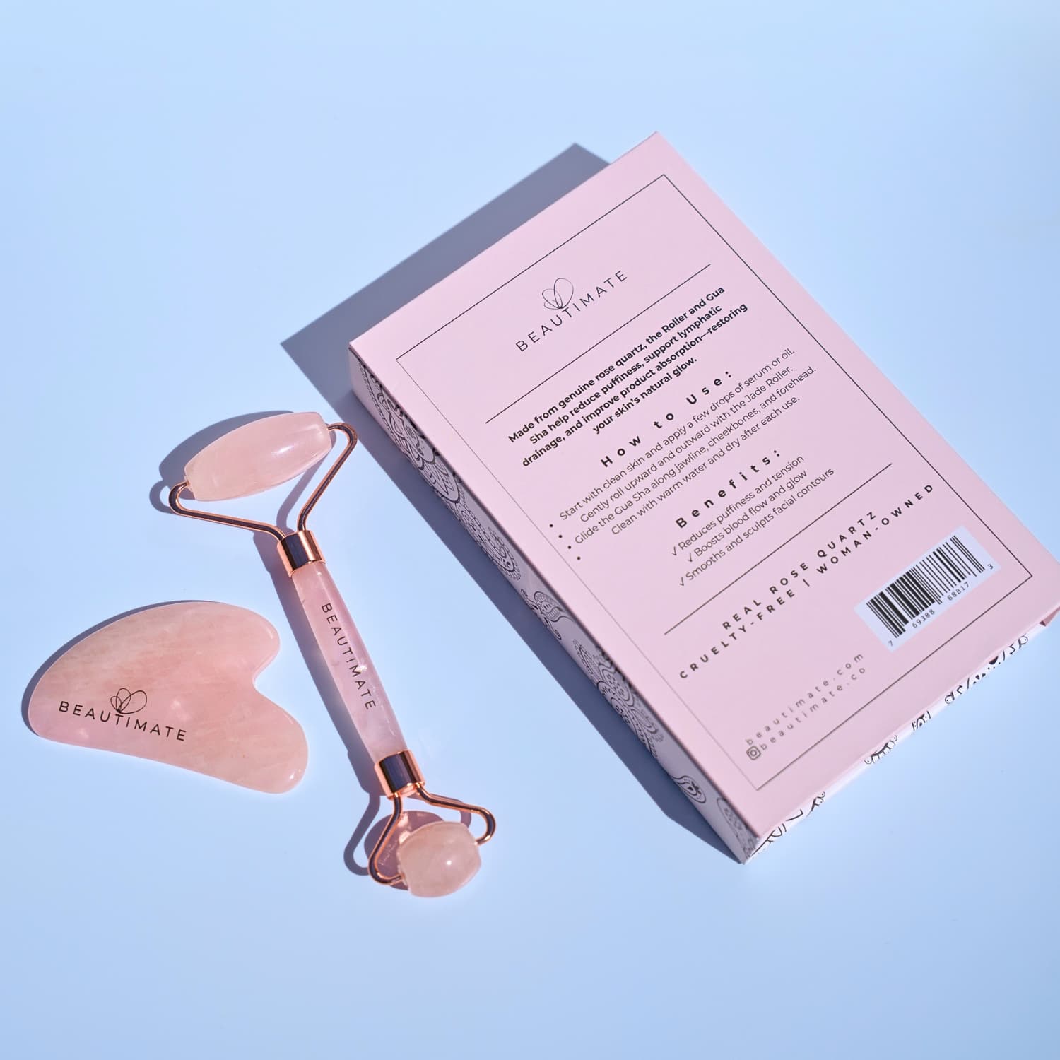 BEAUTIMATE facial roller and gua sha tool with packaging on a light blue background