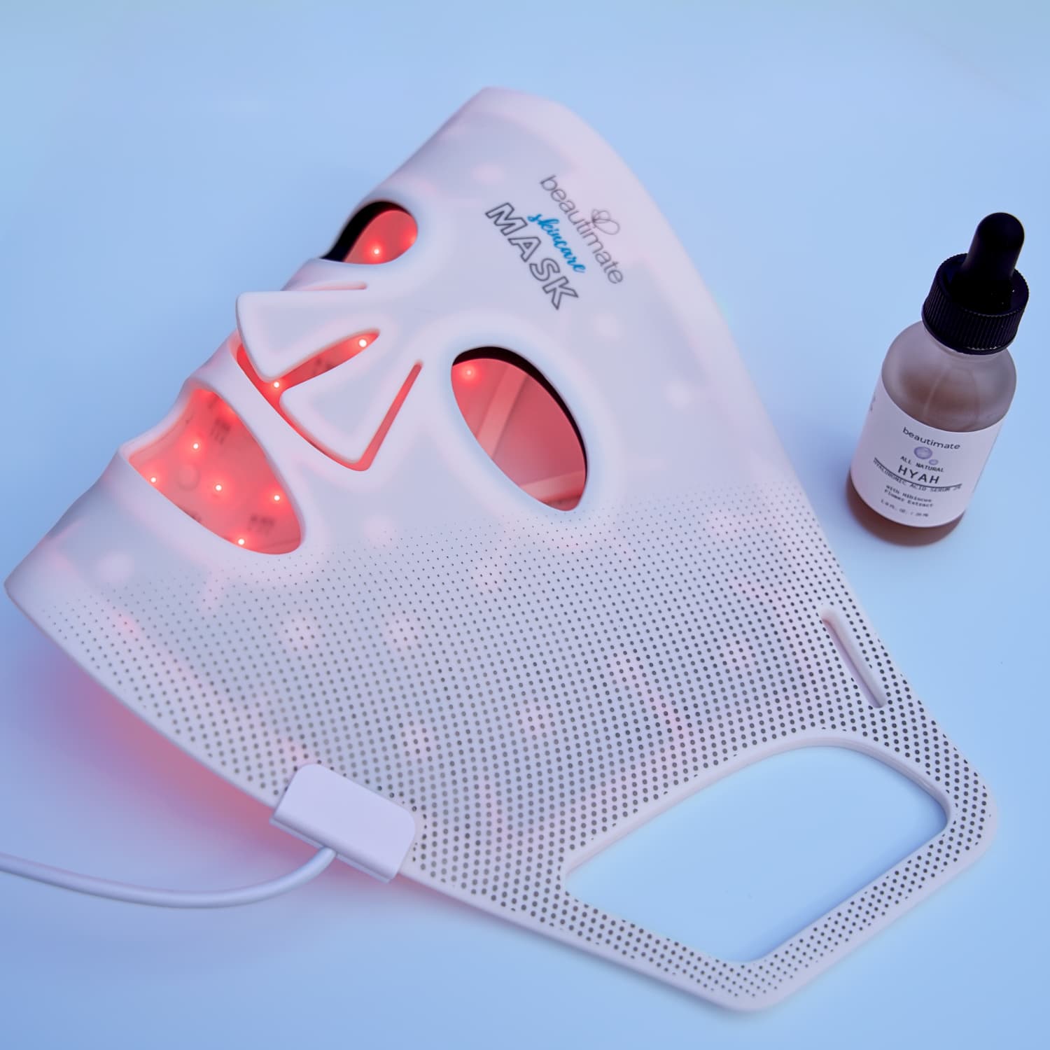 LED light therapy mask with hyaluronic acid serum for post-treatment hydration
