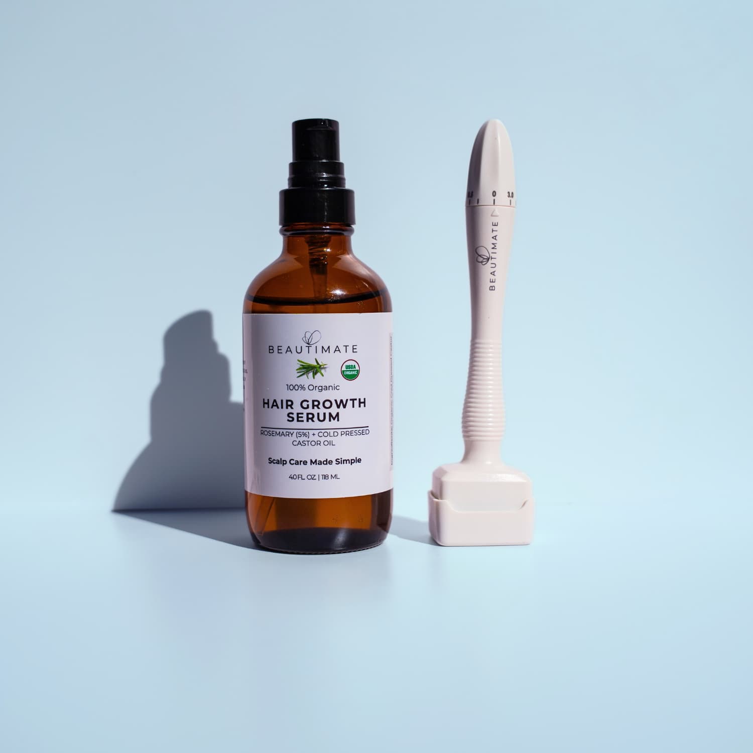 beautimate Hair growth serum bottle with adjustable derma stamp on a light blue background