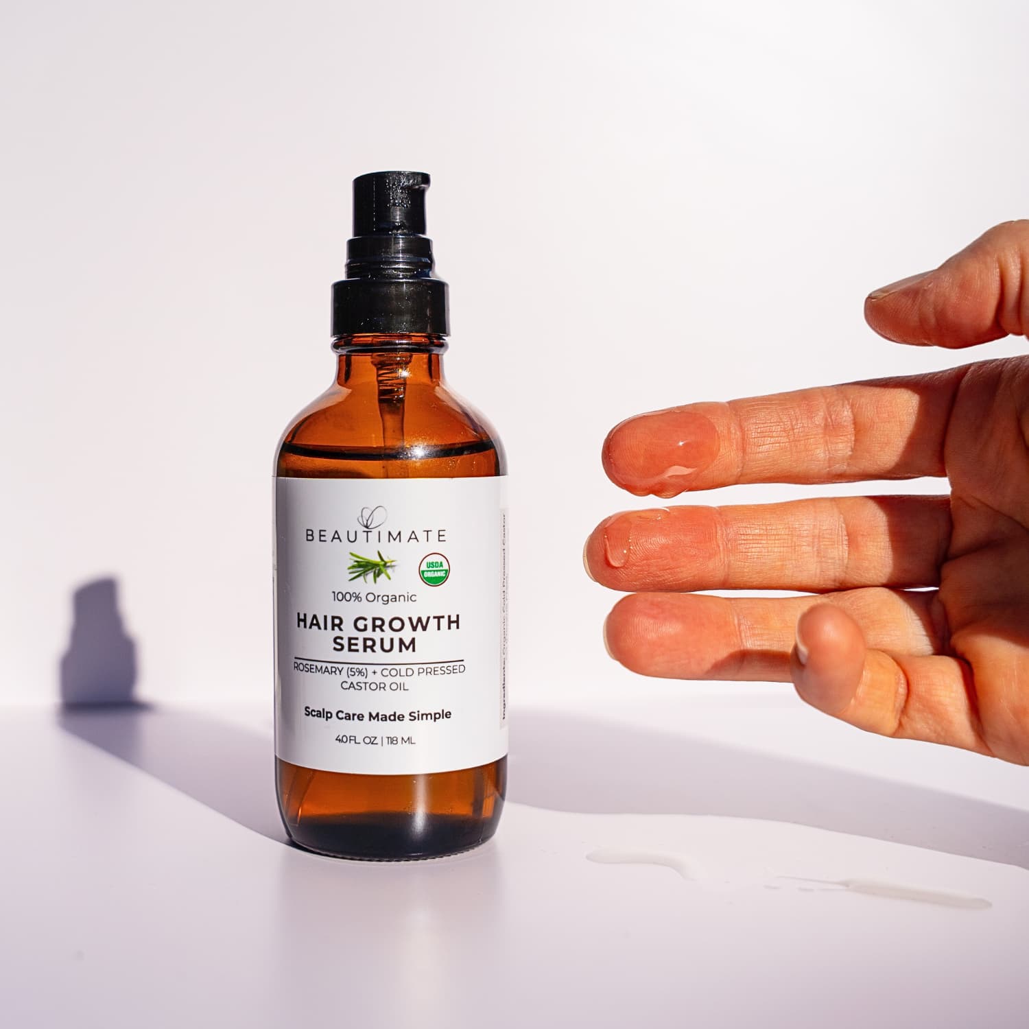 Beautimate certified organic hair serum blend of rosemary and castor oils