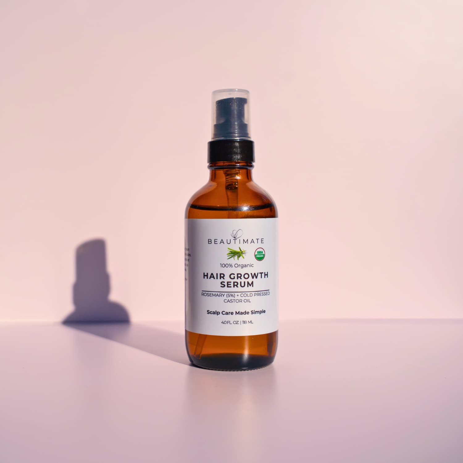 Organic rosemary castor oil serum to support hair growth and reduce thinning