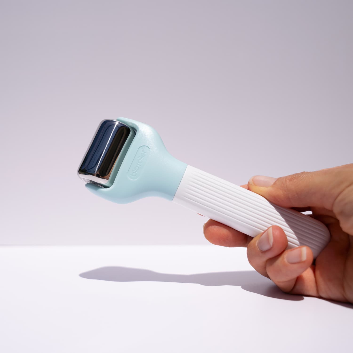 Detail view of Beautimate stainless steel ice roller included in 10-in-1 skincare set