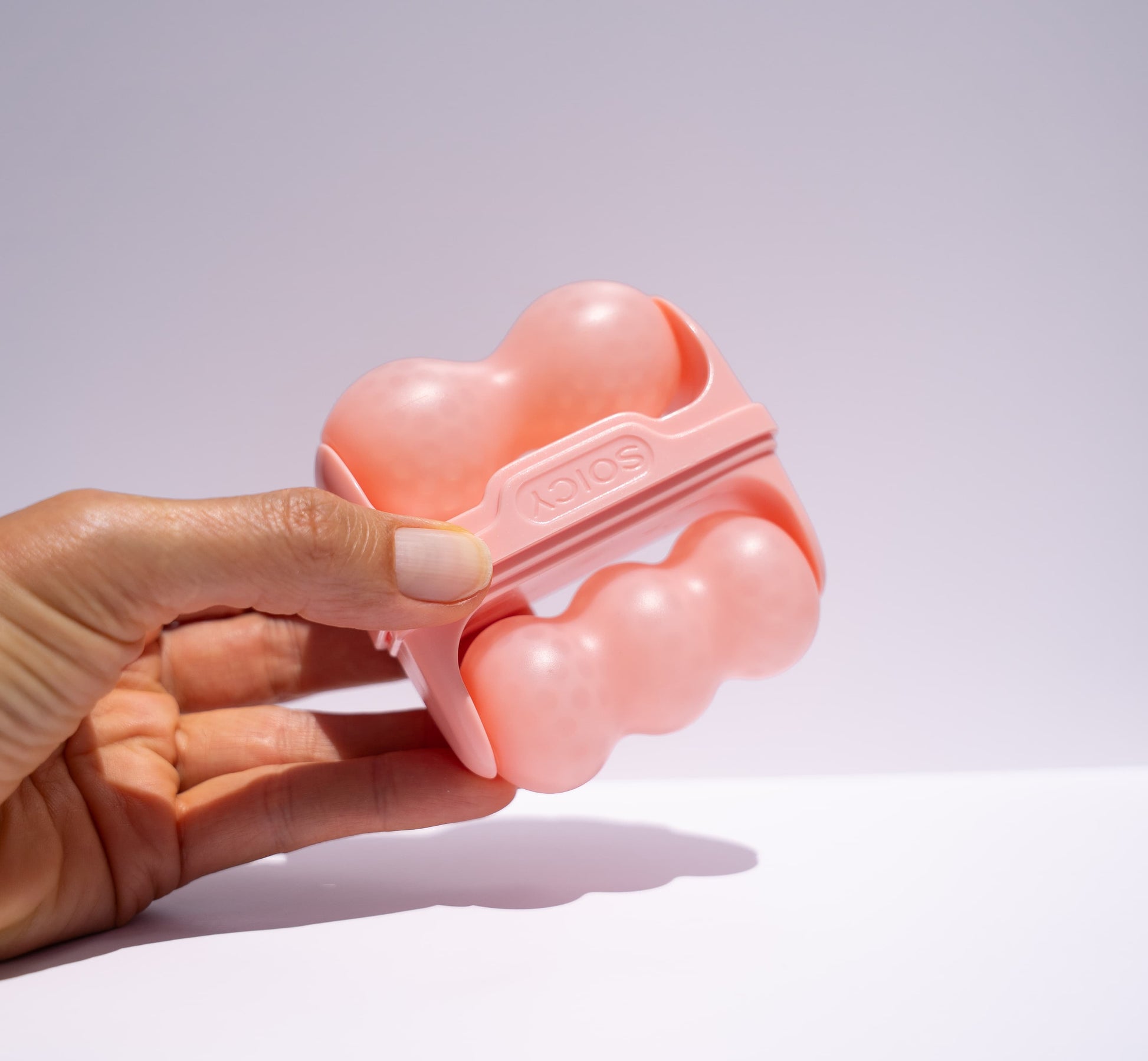 Double-sided  ice roller for puffiness, redness, and post-treatment soothing in pink